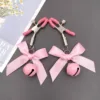 Pink Bow Bell Nipple Clamps